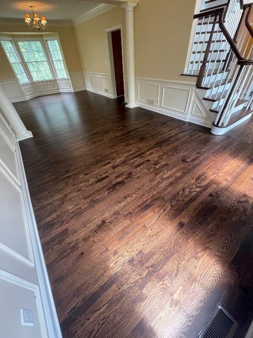 Dark stained hardwood in a foyer
